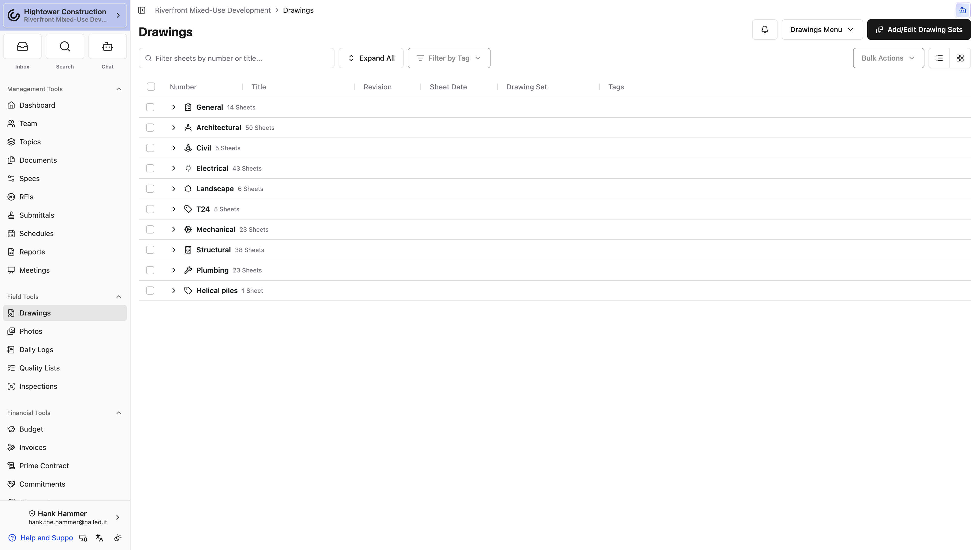Desktop: The Drawings page groups current sheets by discipline and provides search, tag, bulk, and view controls.